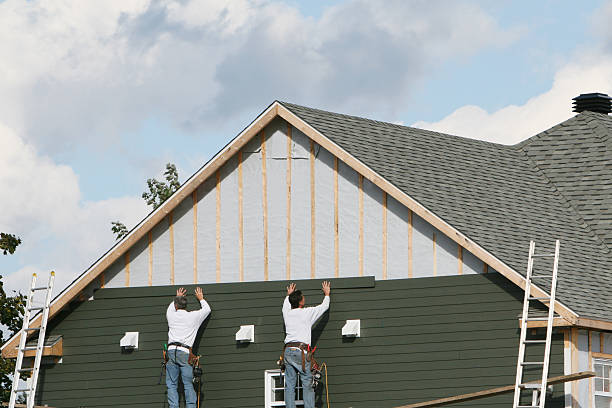 Professional Siding Installation technician working in Greenville, VA
